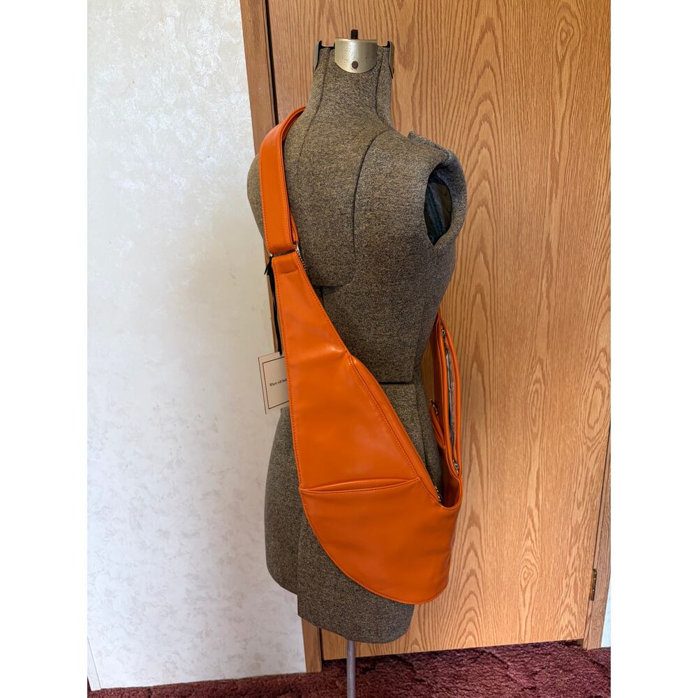 NWT Terracotta Sash faux Leather Bag with multiple pockets and adjustable strap